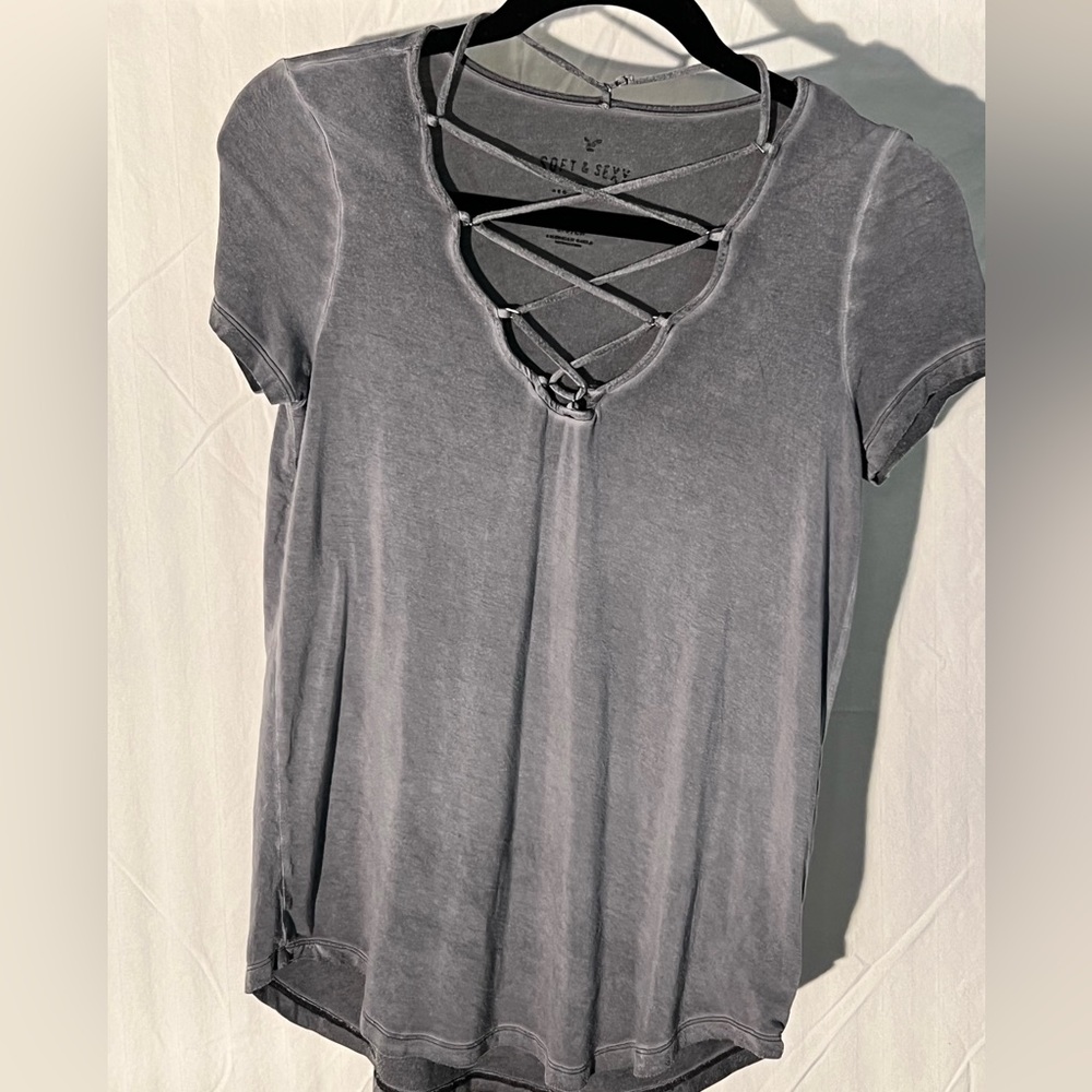 American Eagle top with deep V lacing on Front. Size S